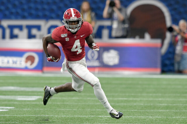 Alabama Crimson Tide wide receiver Jerry Jeudy (4) carries the ball up the field against the Duke Blue Devils during the first quarter at Mercedes-Benz Stadium.