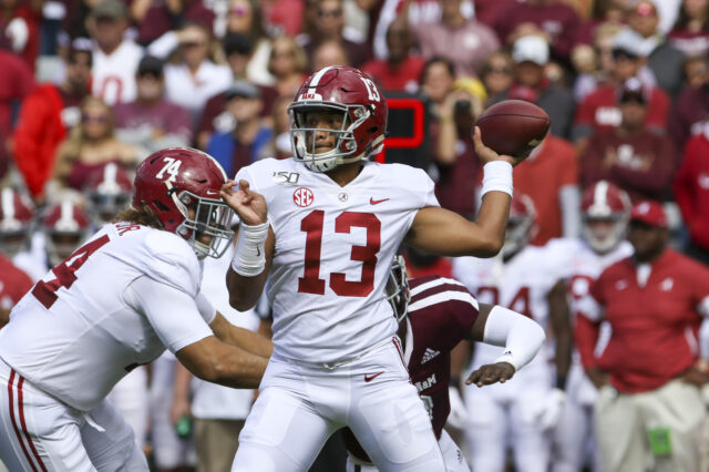 Alabama Crimson Tide quarterback Tua Tagovailoa (13) drops back to pass during the first quarter against the Texas A&M Aggies at Kyle Field.