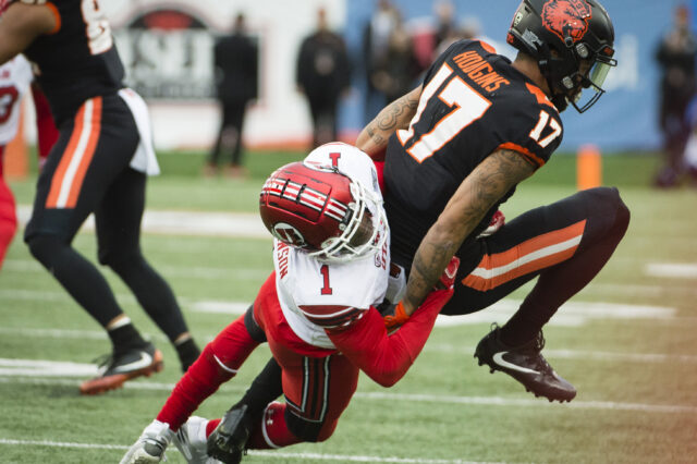 Oregon State Beavers wide receiver Isaiah Hodgins (17) is tackled on a pass play by Utah Utes defensive back Jaylon Johnson (1) during the first half at Reser Stadium.