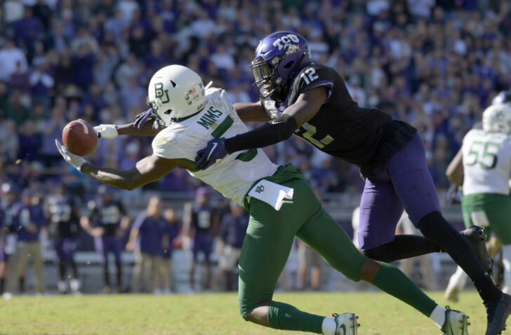 Baylor Bears wide receiver Denzel Mims (5) catches a pass against TCU Horned Frogs cornerback Jeff Gladney (12) in overtime at Amon G. Carter Stadium. Baylor won 29-23 in triple overtime.