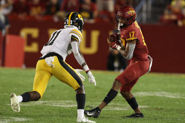 Iowa Hawkeyes defensive back Michael Ojemudia (11) looks to tackle Iowa State Cyclones wide receiver Darren Wilson (17) at Jack Trice Stadium. Iowa beat Iowa State 18-17.