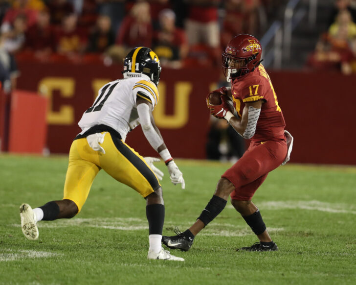 Iowa Hawkeyes defensive back Michael Ojemudia (11) looks to tackle Iowa State Cyclones wide receiver Darren Wilson (17) at Jack Trice Stadium. Iowa beat Iowa State 18-17.