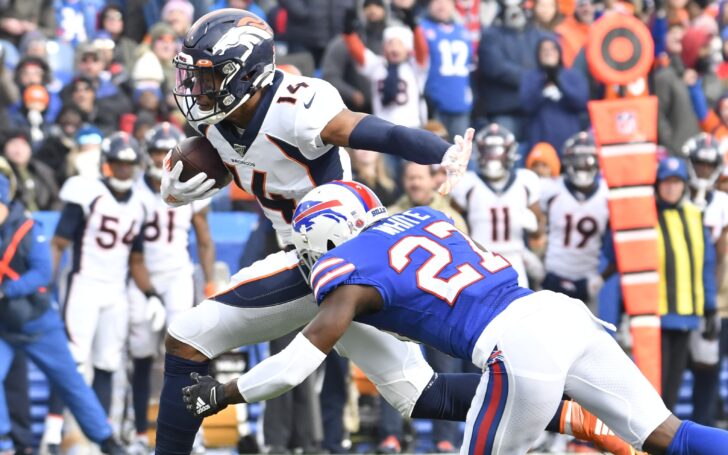 Courtland Sutton runs through a tackle. Credit: Mark Konezny, USA TODAY Sports.