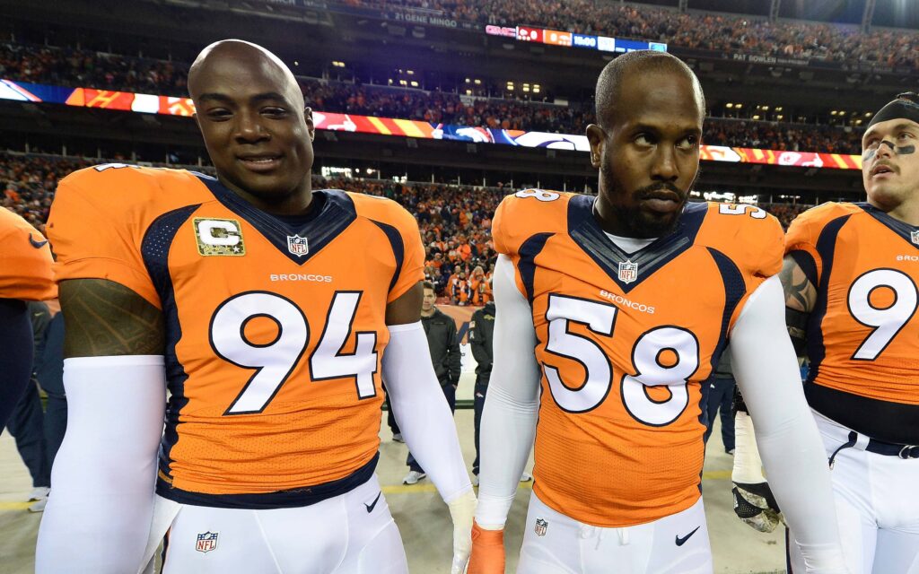 DeMarcus Ware, Von Miller and Derek Wolfe. Credit: Ron Chenoy, USA TODAY Sports.