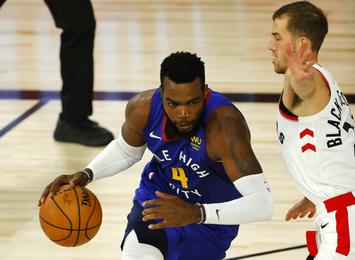 aul Millsap #4 of the Denver Nuggets drives the ball past Matt Thomas #21 of the Toronto Raptors during the second quarter at The Field House at ESPN Wide World Of Sports Complex on August 14, 2020 in Lake Buena Vista, Florida.