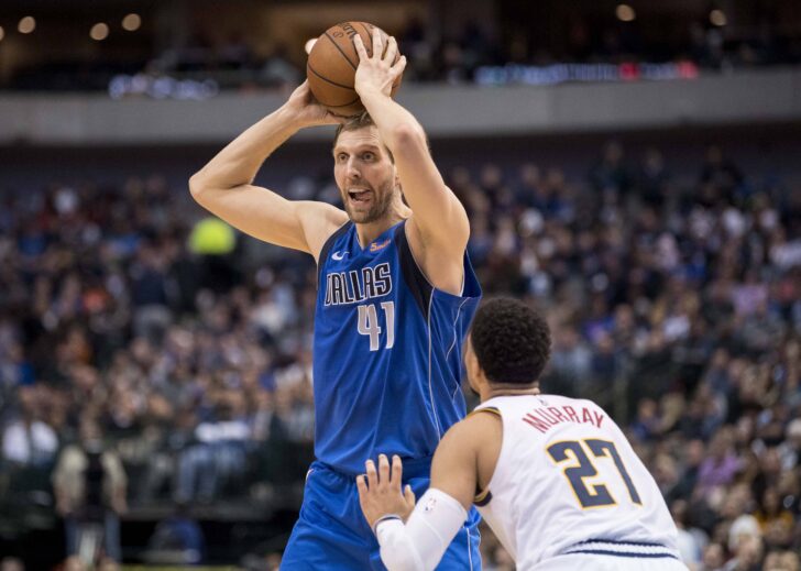 Dallas Mavericks forward Dirk Nowitzki (41) looks to pass the ball over Denver Nuggets guard Jamal Murray (27) during second quarter at the American Airlines Center.