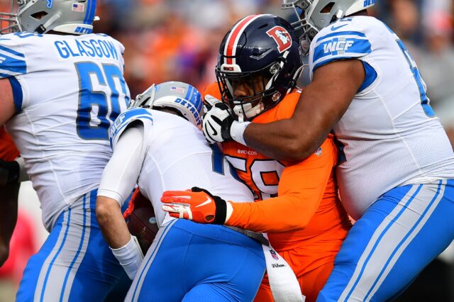 Malik Reed with a sack against the Lions in 2019. Credit: Ron Chenoy, USA TODAY Sports.