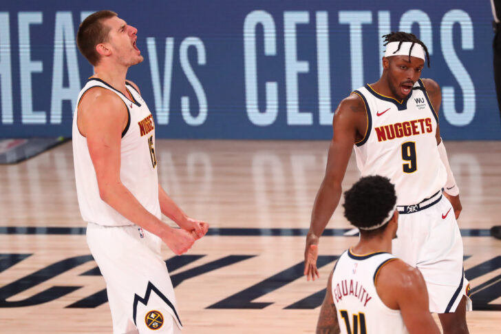 Denver Nuggets center Nikola Jokic (15) celebrates during the second half in game seven of the second round of the 2020 NBA Playoffs against the Los Angeles Clippersat ESPN Wide World of Sports Complex.