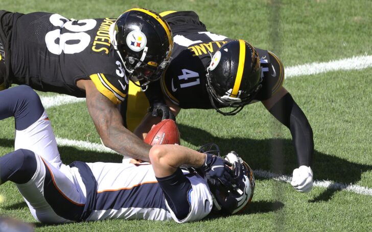 Broncos punter Colby Wadman tackled in the end zone for a safety. Credit: Charles LeClaire, USA TODAY Sports.