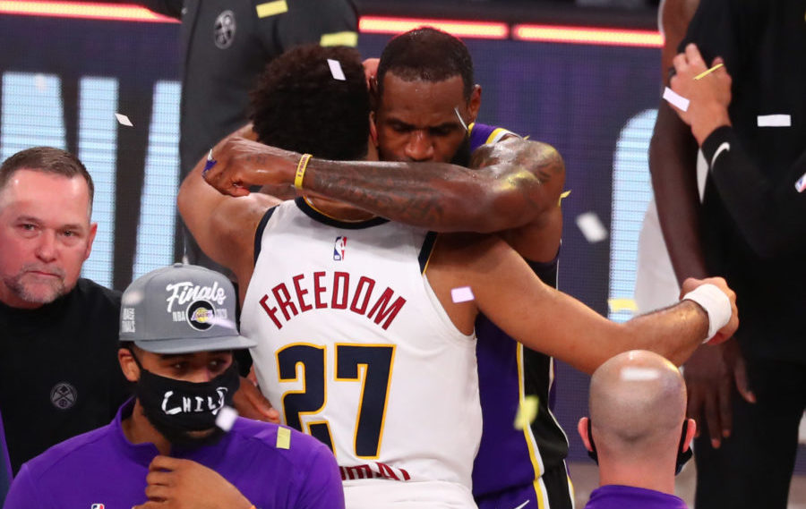 Los Angeles Lakers forward LeBron James (23) greets Denver Nuggets guard Jamal Murray (27) after game five of the Western Conference Finals of the 2020 NBA Playoffs at AdventHealth Arena.