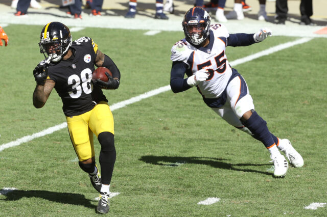 Pittsburgh Steelers running back Jaylen Samuels (38) runs the ball as Denver Broncos outside linebacker Bradley Chubb (55) chases during the third quarter at Heinz Field. The Steelers won 26-21.