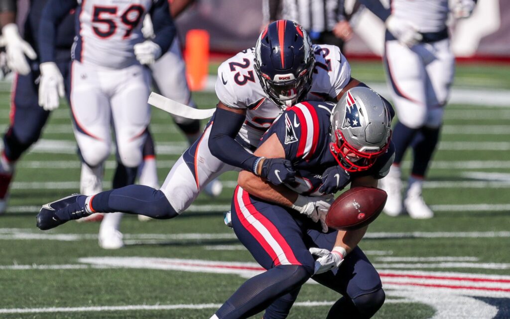 Michael Ojemudia forces Ryan Izzo to fumble. Credit: Paul Rutherford, USA TODAY Sports.