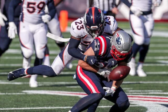 Michael Ojemudia forces Ryan Izzo to fumble. Credit: Paul Rutherford, USA TODAY Sports.