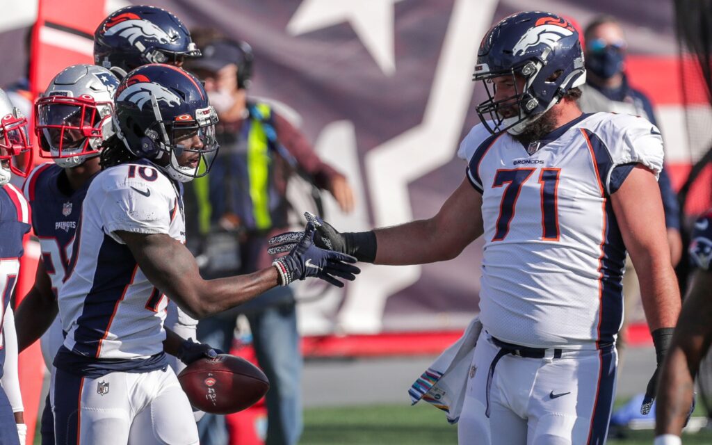 Austin Schlottmann celebrates a touchdown with Jerry Jeudy. Credit: Paul Rutherford, USA TODAY Sports.