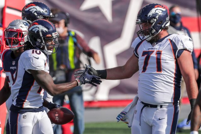 Austin Schlottmann celebrates a touchdown with Jerry Jeudy. Credit: Paul Rutherford, USA TODAY Sports.