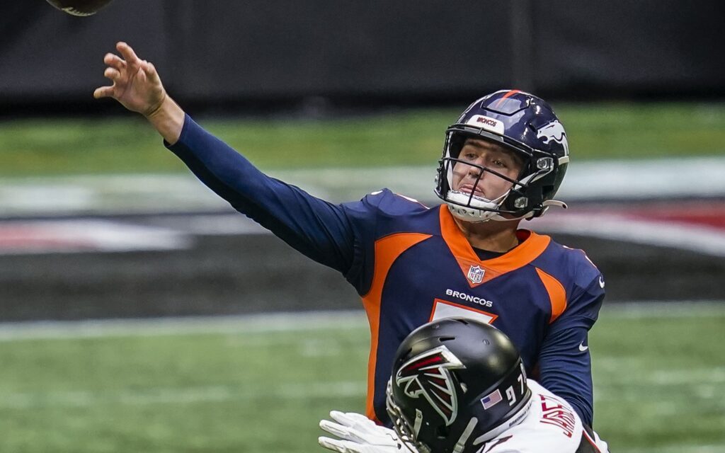 Drew Lock throws under pressure in Sunday's loss in Atlanta. Credit: Grady Jarrett, USA TODAY Sports.