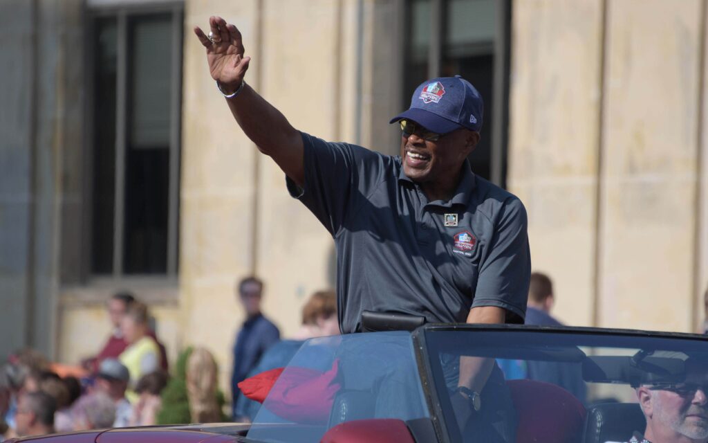 Floyd Little waves to the crowd at the 2018 Pro Football Hall of Fame parade. Credit: Kirby Lee, USA TODAY Sports.