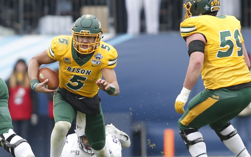 Trey Lance runs in January 2020. Credit: Tim Heitman, USA TODAY Sports.