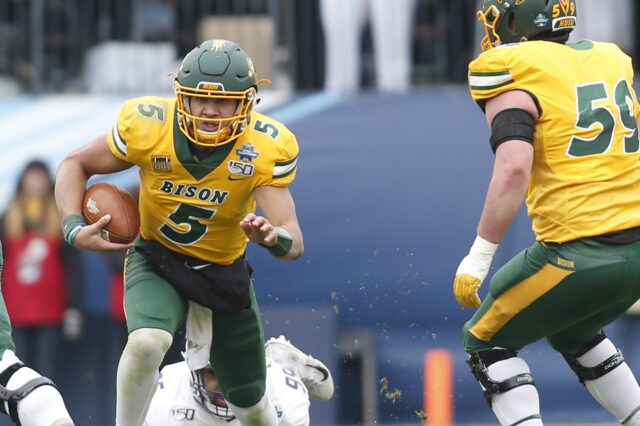 Trey Lance runs in January 2020. Credit: Tim Heitman, USA TODAY Sports.