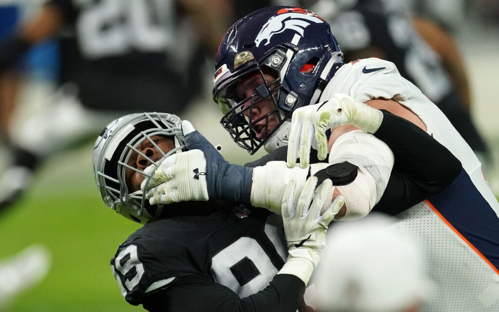 Garett Bolles blocks a Raiders player. Credit Kirby Lee, USA TODAY Sports.