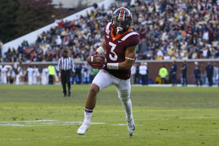 Virginia Tech Hokies defensive back Caleb Farley (3) returns an interception for a touchdown against the Georgia Tech Yellow Jackets in the second quarter at Bobby Dodd Stadium.