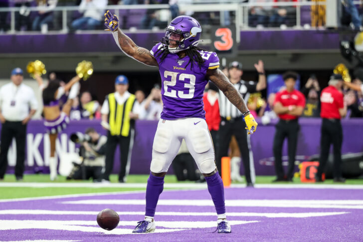 Minnesota Vikings running back Mike Boone (23) celebrates a touchdown during the fourth quarter against the Chicago Bears at U.S. Bank Stadium.