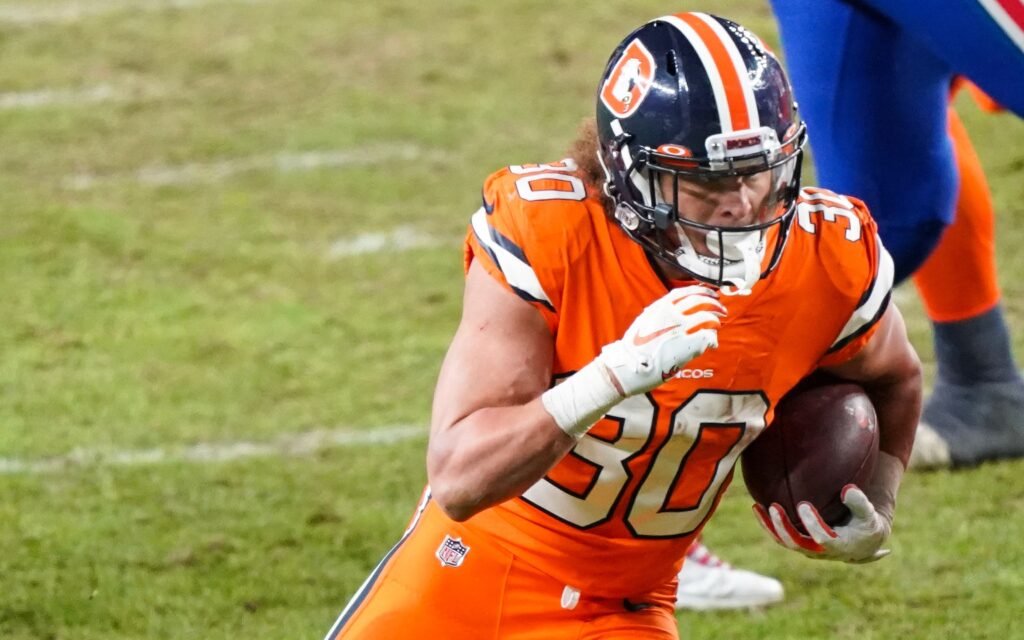 Phillip Lindsay runs versus Buffalo. Credit: Troy Babbitt, USA TODAY Sports.