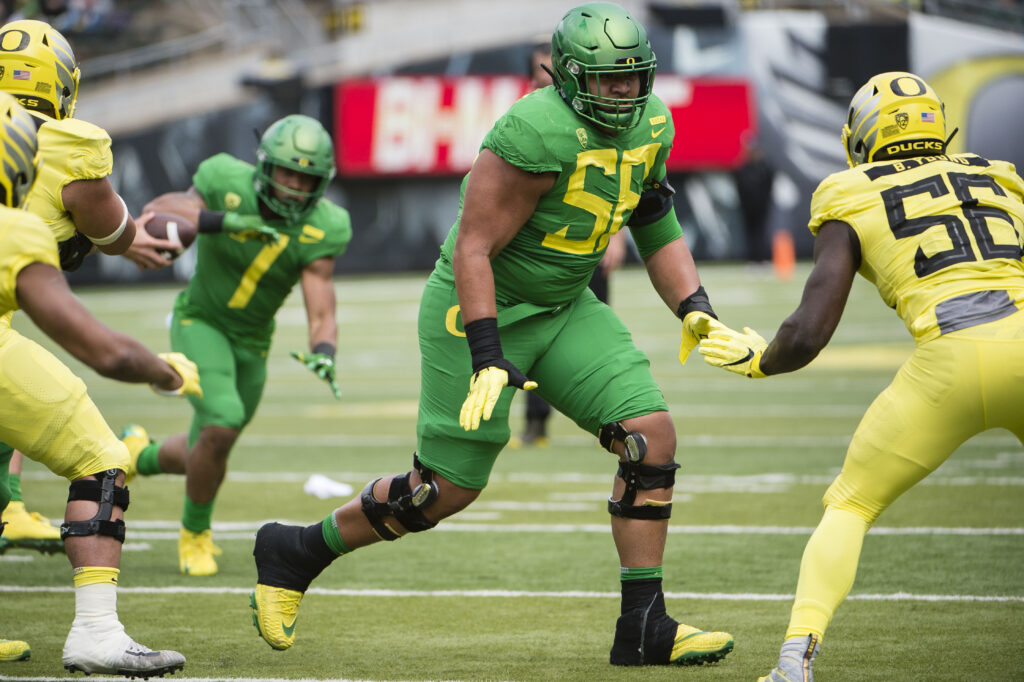 Oregon Ducks offensive lineman Penei Sewell (58) blocks a defender during the Oregon spring game at Autzen Stadium. Mighty Oregon beat Fighting Ducks 20-13.