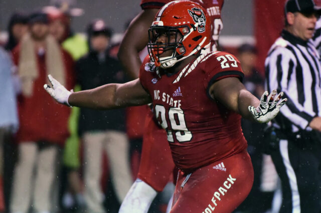 North Carolina State Wolfpack defensive tackle Alim McNeill (29) celebrates after a sack against the North Carolina Tar Heels during the first half at Carter-Finley Stadium.