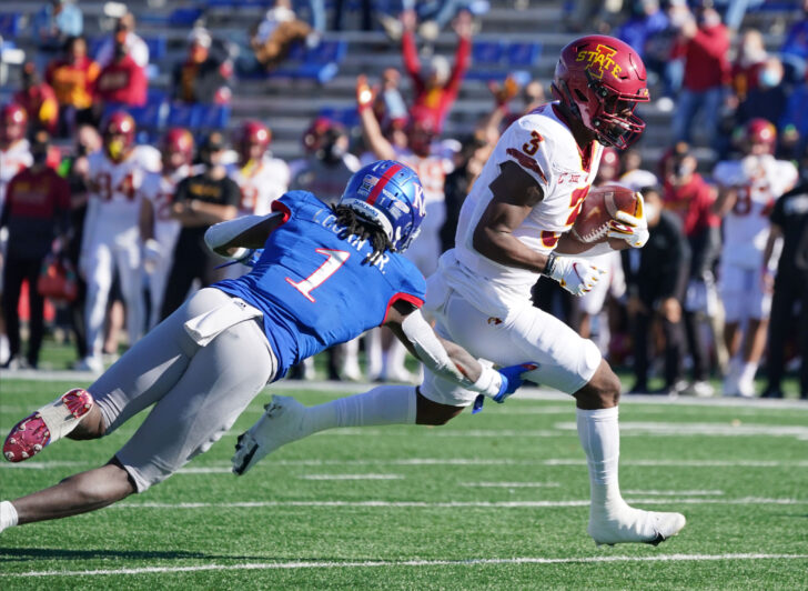 Iowa State Cyclones running back Kene Nwangwu (3) runs the ball as Kansas Jayhawks safety Kenny Logan Jr. (1) attempts a tackle during the game at David Booth Kansas Memorial Stadium.