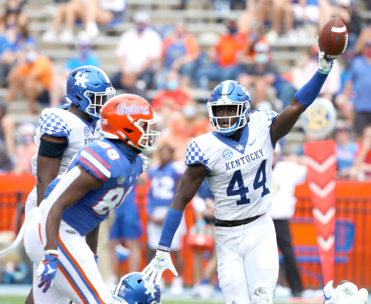 Kentucky Wildcats linebacker Jamin Davis (44) comes up with a fumbled ball during a football game against the Florida Gators at Ben Hill Griffin Stadium in Gainesville, Fla. Nov. 28, 2020.