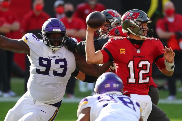 Shamar Stephen rushes Tom Brady. Credit: Kim Klement, USA TODAY Sports.