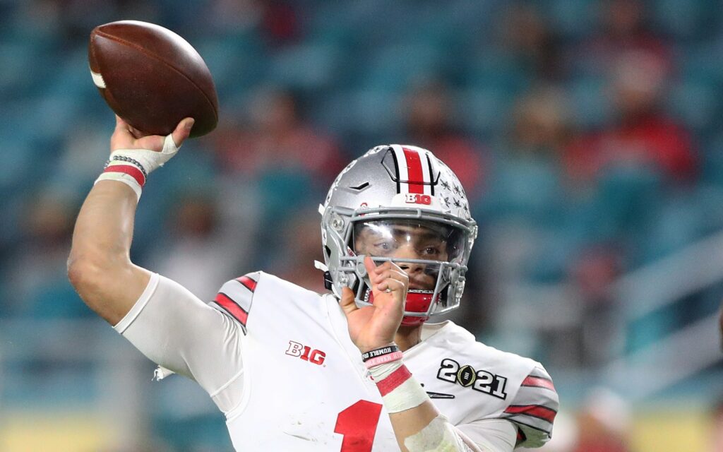 Justin Fields throws in the National Championship. Credit: Mark. J Rebilas, USA TODAY Sports.