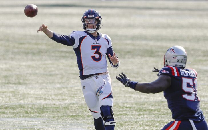 Drew Lock throws off-balance, like he does too often. Credit: Winslow Townson, USA TODAY Sports.