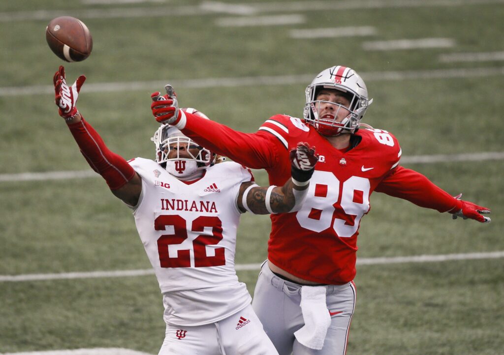 Ohio State Buckeyes tight end Luke Farrell (89) misses a pass under pressure from Indiana Hoosiers defensive back Jamar Johnson (22) during the first quarter of a NCAA Division I football game between the Ohio State Buckeyes and the Indiana Hoosiers on Saturday, Nov. 21, 2020 at Ohio Stadium in Columbus, Ohio.