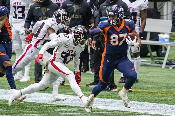 Denver Broncos tight end Noah Fant (87) runs against Atlanta Falcons safety Ricardo Allen (37) during the first quarter at Mercedes-Benz Stadium.