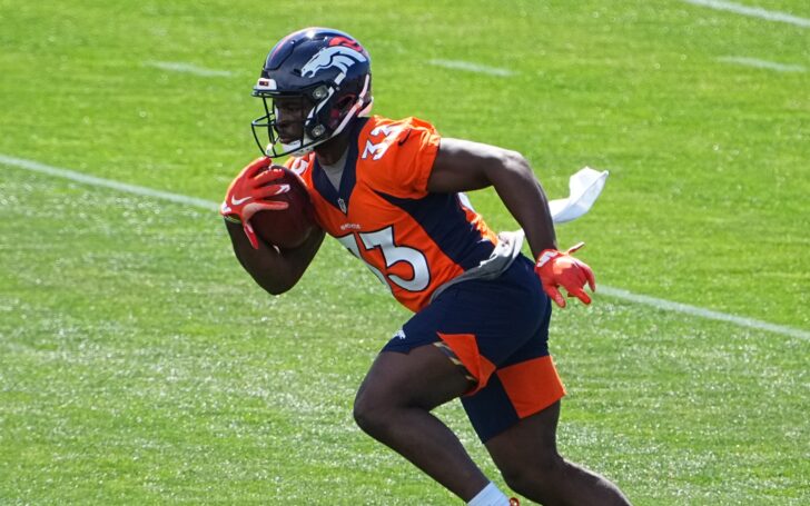 Javonte Williams runs in OTAs. Credit: Ron Chenoy, USA TODAY Sports.