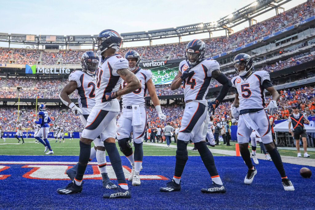 Denver Broncos wide receiver Tim Patrick (81) celebrates his touchdown with teammates during the first half against the New York Giants at MetLife Stadium.