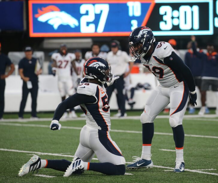 Von Miller of Denver celebrates with Malik Reed in the fourth quarter after they stopped the giants offense as the Denver Broncos came to MetLife Stadium in East Rutherford, NJ and beat the New York Giants 27-13 in the first game of the 2021 season on September 12, 2021.