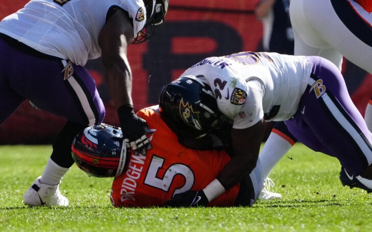 Teddy Bridgewater sacked. Credit: Ron Chenoy, USA TODAY Sports.