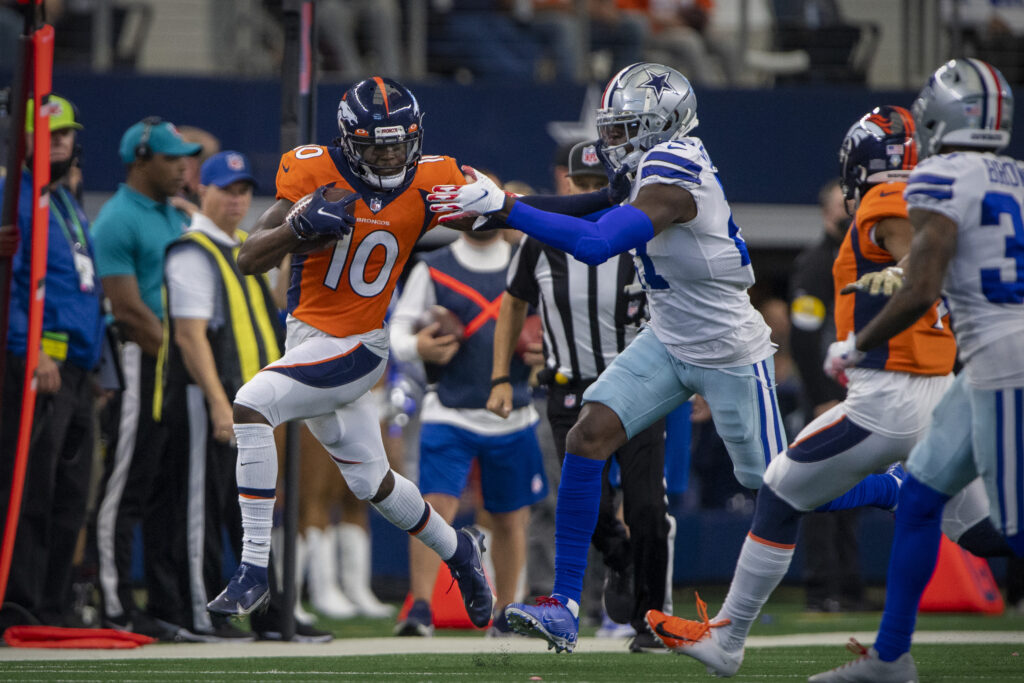 Denver Broncos wide receiver Jerry Jeudy (10) catches a pass for a first down against the Dallas Cowboys during the second half at AT&T Stadium.