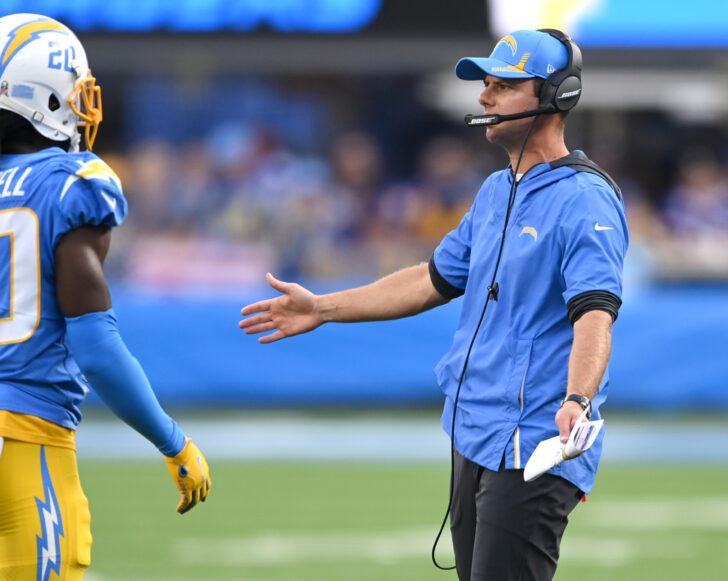 Los Angeles Chargers head coach Brandon Staley shakes hands with players as they come off the field during in the first half against against the Minnesota Vikings at SoFi Stadium.