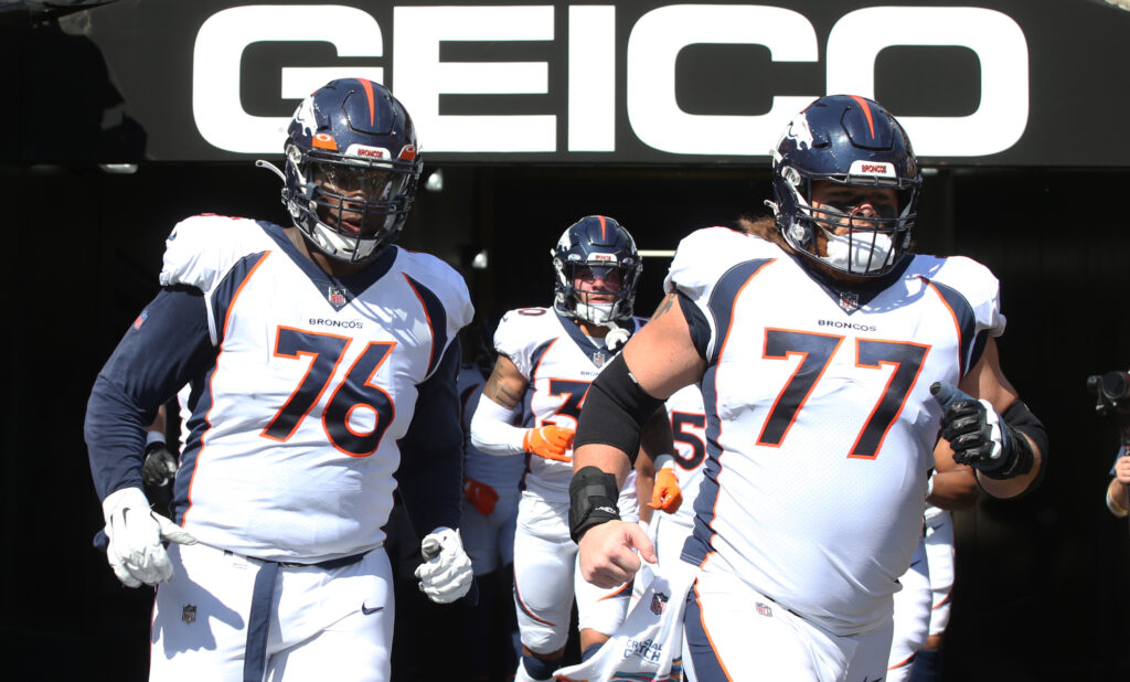 Denver Broncos offensive tackle Calvin Anderson (76) and guard Quinn Meinerz (77) take the field to play the Pittsburgh Steelers at Heinz Field. The Steelers won 27-19.