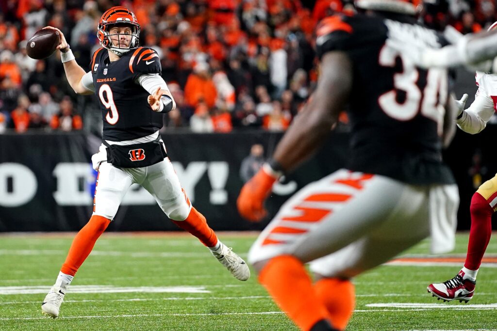 Cincinnati Bengals quarterback Joe Burrow (9) throws a touchdown pass to Cincinnati Bengals wide receiver Ja'Marr Chase (1) (not pictured) in the fourth quarter of a Week 14 NFL football game against the San Francisco 49ers, Sunday, Dec. 12, 2021, Paul Brown Stadium in Cincinnati. The San Francisco 49ers defeated the Cincinnati Bengals, 26-23.