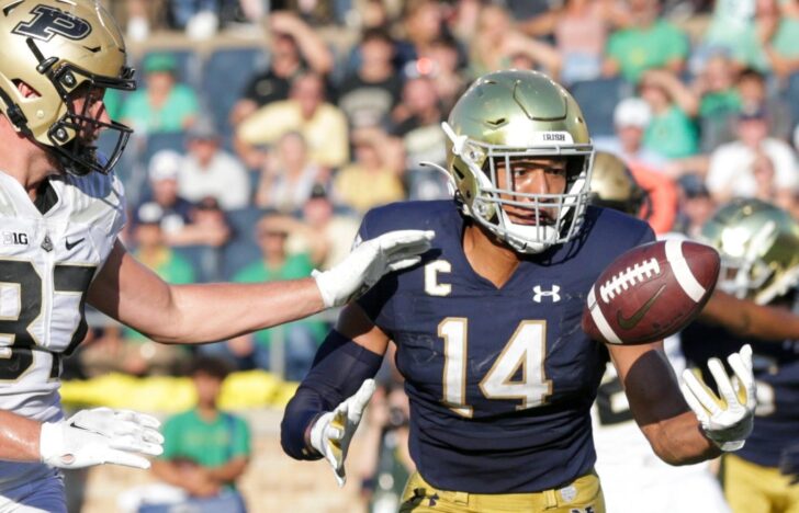 Notre Dame safety Kyle Hamilton (14) intercepts a pass intended for Purdue tight end Payne Durham (87) in the end zone during the fourth quarter of an NCAA football game, Saturday, Sept. 18, 2021 at Notre Dame Stadium in South Bend.