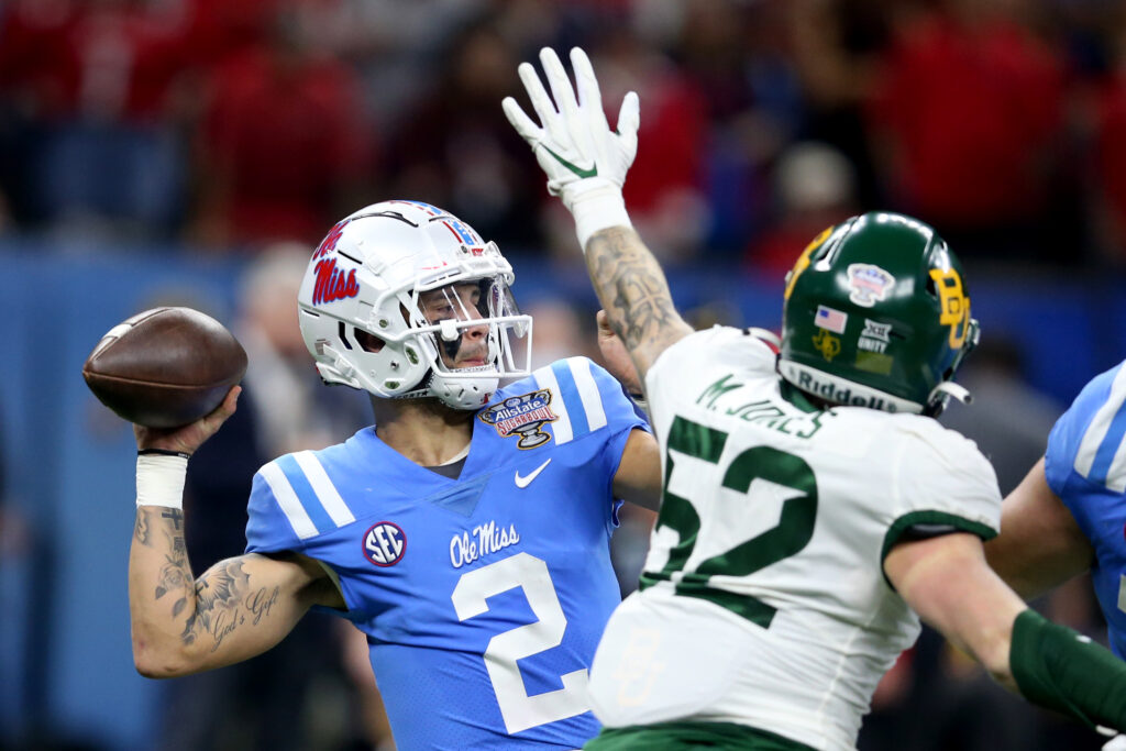 Mississippi Rebels quarterback Matt Corral (2) is pressured by Baylor Bears linebacker Matt Jones (52) in the first quarter of the 2022 Sugar Bowl at the Caesars Superdome.