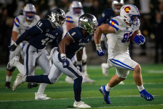 Colorado State senior tight end Trey McBride carries the football during a game against Nevada on Saturday