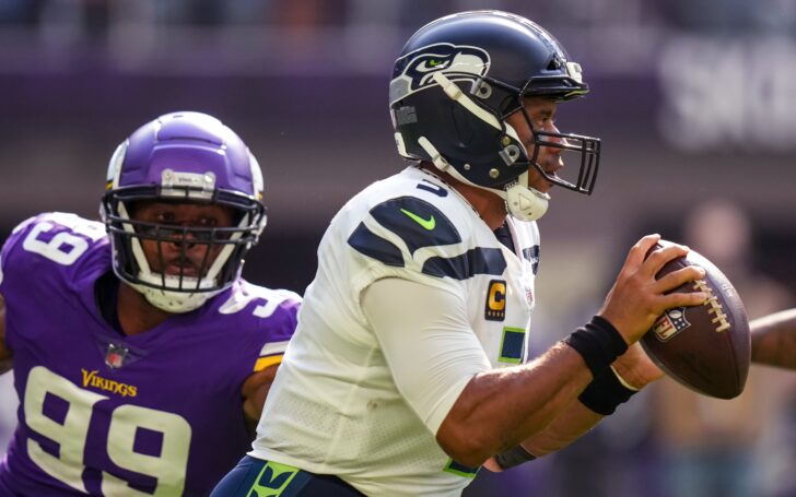 Russell Wilson pressured. Credit: Brace Hemmelgarn, USA TODAY Sports.