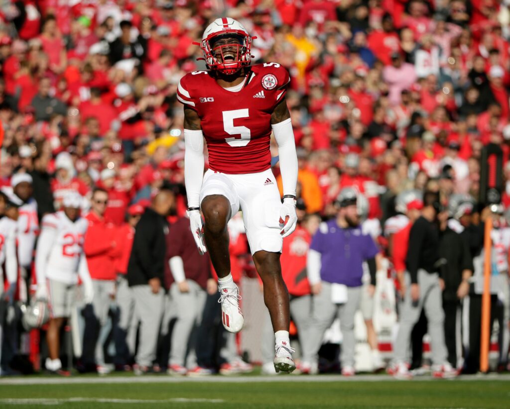 Nebraska Cornhuskers cornerback Cam Taylor-Britt (5) celebrates after successfully breaking up a pass intended for Ohio State Buckeyes wide receiver Chris Olave (2) during Saturday's NCAA Division I football game at Memorial Stadium in Lincoln, Neb., on November 6, 2021.