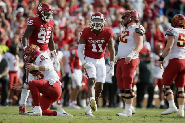 Oklahoma's Nik Bonitto (11) celebrates after sacking Iowa State's Brock Purdy (15) during a college football game between the University of Oklahoma Sooners (OU) and the Iowa State Cyclones at Gaylord Family-Oklahoma Memorial Stadium in Norman, Okla., Saturday, Nov. 20, 2021. Oklahoma won 28-21.